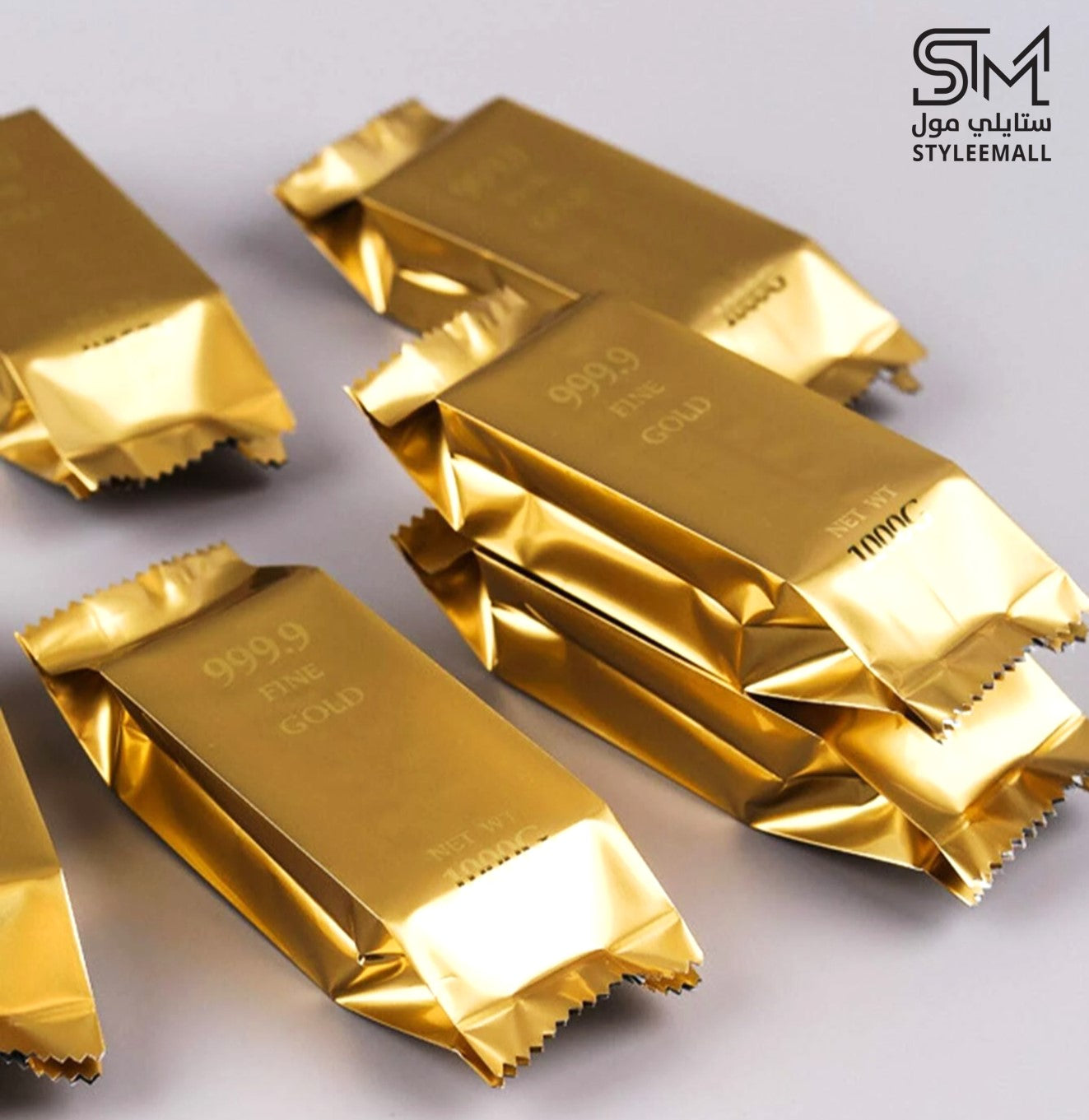 توزيعات العود الطبيعي على شكل سبائك الذهب