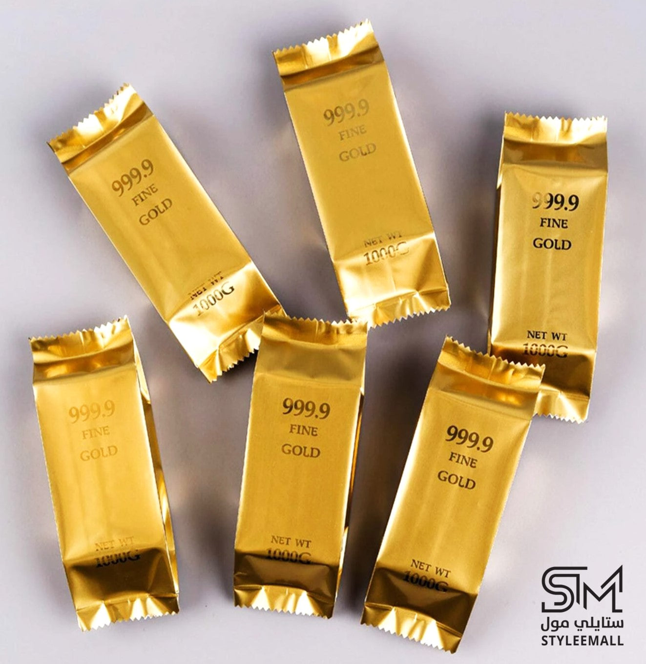 توزيعات العود الطبيعي على شكل سبائك الذهب