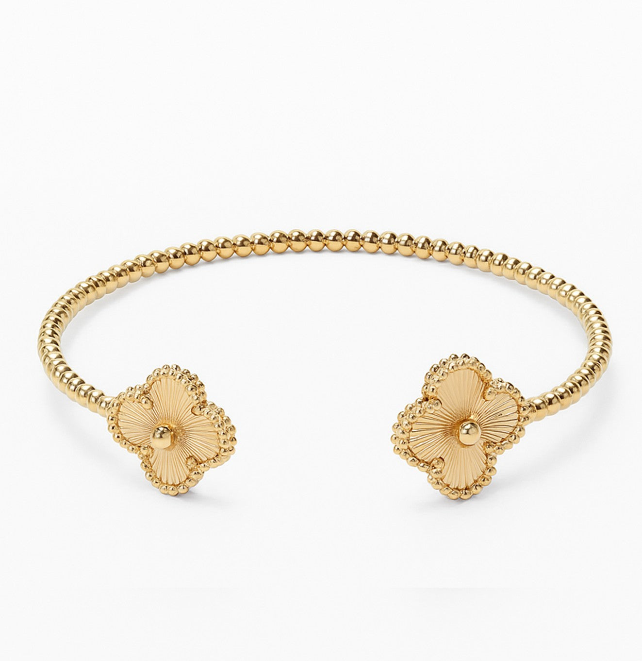 سوار ذهبي مفتوح بتصميم زهرتين محفورتين