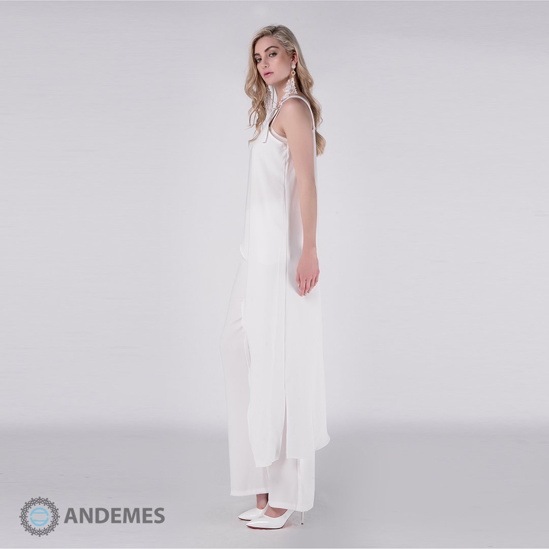طقم بنطال وبلوزة بيضاء بتصميم عصري وفريد - StyleeMall